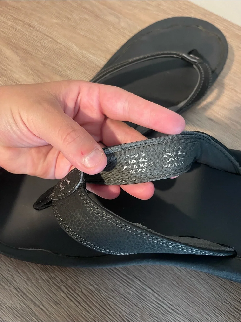 Olukai Men's Black Leather Flip-Flop Sandals